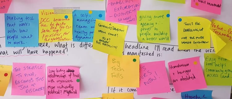 a flip chart with colourful postits with ideas about the future of DCC